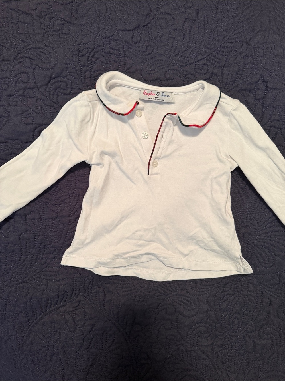 White Long-Sleeve Polo Top with Red Plaid Trim